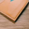 Porte feuille en cuir Bicolore sur mesure.